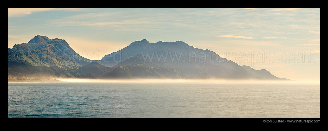 Image of Mt Alexander (1197m left), Seaward Valley, Mts Batty (1195m) and Patutu (1162m) (centre), to Clarence River, seen looking north from offshore of Kaikoura in morning light. Panorama, Kaikoura, Kaikoura District, Canterbury Region, New Zealand (NZ) stock photo image