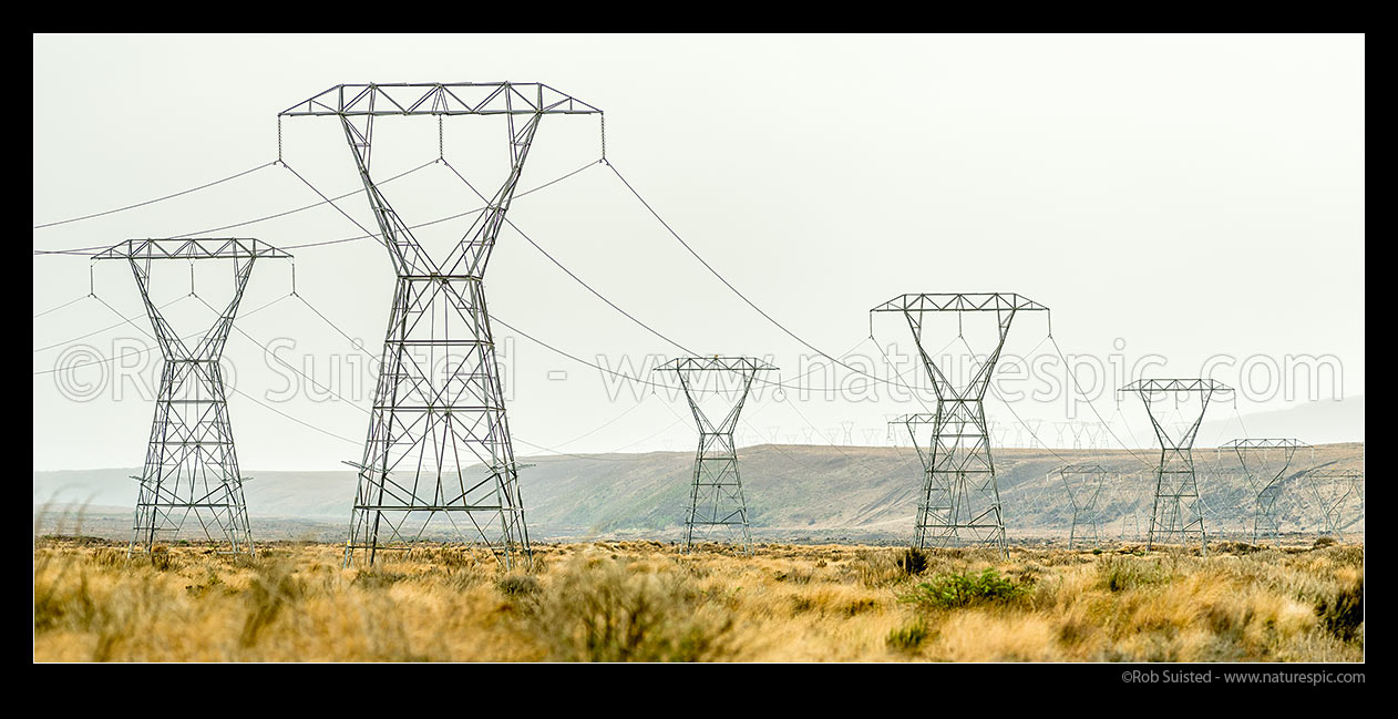 Image of Electricity power pylons crossing the Rangipo Desert near the SH1 Desert Road. National grid transmission lines. Panorama, Waiouru, Ruapehu District, Manawatu-Wanganui Region, New Zealand (NZ) stock photo image