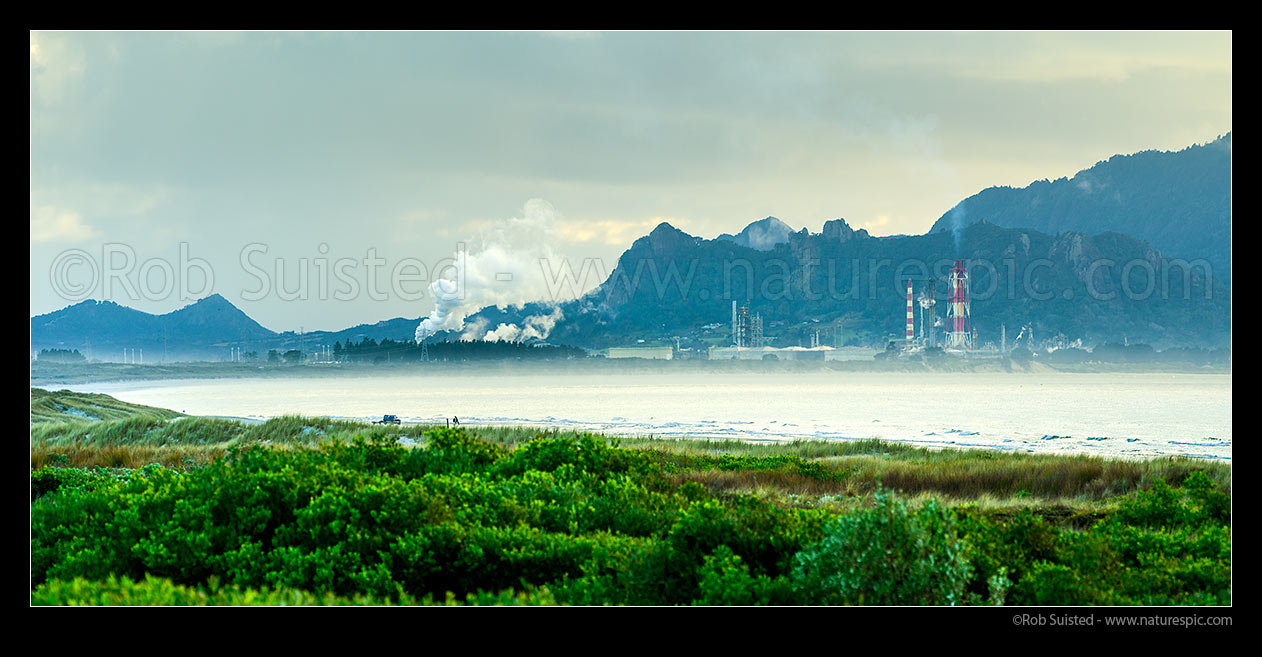 Image of Marsden Point Oil Refinery (right) and power generation station (left) on Whangarei Harbour. Mt Aubrey behind. Bream Bay Panorama, Ruakaka, Whangarei District, Northland Region, New Zealand (NZ) stock photo image