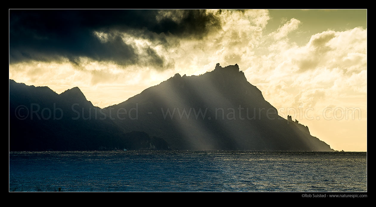 Image of Bream Head (476m), rugged entrance to Whangarei Harbour from Bream Bay, on a moody morning. Panorama, Ruakaka, Whangarei District, Northland Region, New Zealand (NZ) stock photo image