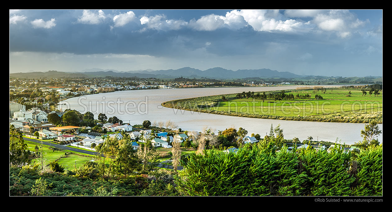 Image of Dargaville township beside the tidal Wairoa River, with the Tangihua Ranges in distance. Evening panorama, Dargaville, Kaipara District, Northland Region, New Zealand (NZ) stock photo image