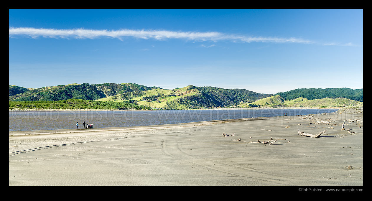 Image of Waikato River mouth just inside Port Waikato. Local people fishing on sand bar. Panorama, Port Waikato, Franklin District, Waikato Region, New Zealand (NZ) stock photo image