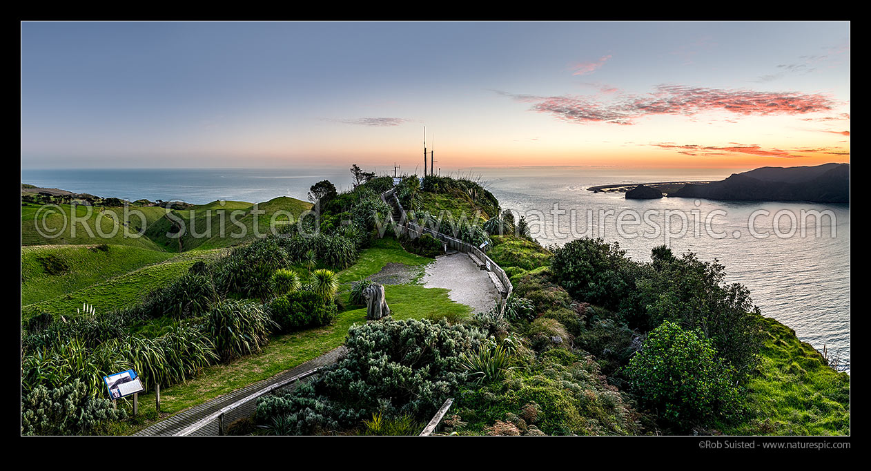 Image of Manukau Harbour entrance seen from lookout and Harbourmaster signal station. Whatipu Beach far right. Dusk panorama, Awhitu Peninsula, Papakura District, Auckland Region, New Zealand (NZ) stock photo image