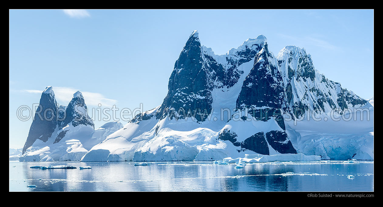 Image of Lemaire Channel, looking at stunning mountains of Graham Land. Una's Peaks at far left. Panorama, Antarctic Peninsula, Antarctica Region, Antarctica stock photo image