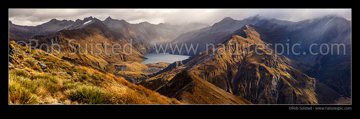 Image of Lochnagar (Lake Lochnagar) above the Shotover River, in the Richardson Mountains and Shotover Conservation Area. Cleft Peak (2250) in cloud, Glencairn Spur left. Panorama, Shotover River, Queenstown Lakes District, Otago Region, New Zealand (NZ) stock photo image