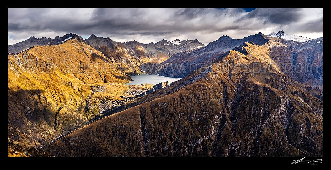 Image of Lochnagar above the Shotover River, in the Richardson Mountains and Shotover Conservation Area. Glencairn Spur left, Cleft Peak (2250) centre and Headlong Peak (2510m) far right. Panorama, Shotover River, Queenstown Lakes District, Otago Region, New Zealand (NZ) stock photo image