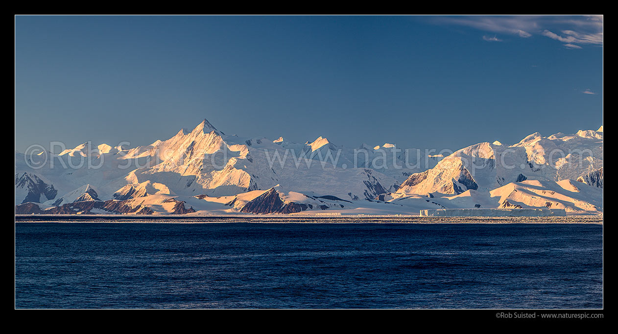 Image of Mount Herschel (3335m) left and Ironside Glacier cleft (centre right) in the Admiralty Mountains. Panorama, Ross Sea, Antarctica Region, Antarctica stock photo image