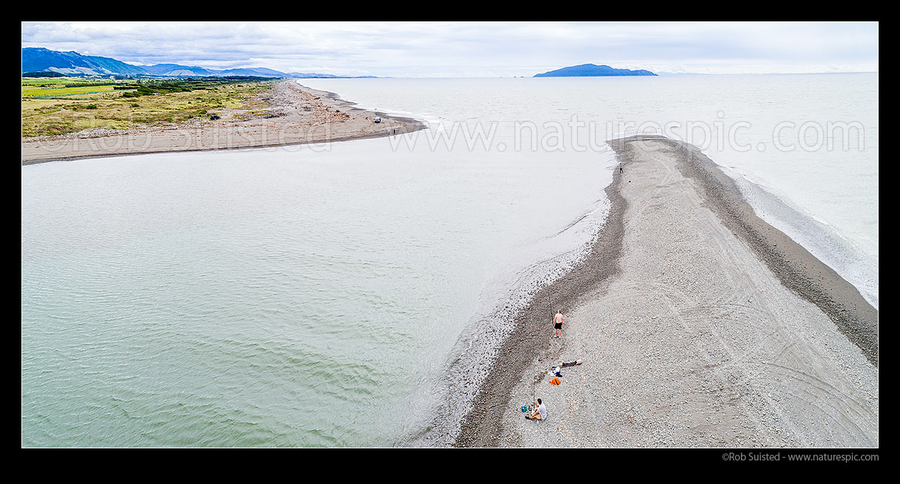 Image of Fishers at the Otaki River mouth recreational surfcasting on gravel sandspit. Kapiti Island behind. Aerial panorama, Otaki Beach, Kapiti Coast District, Wellington Region, New Zealand (NZ) stock photo image