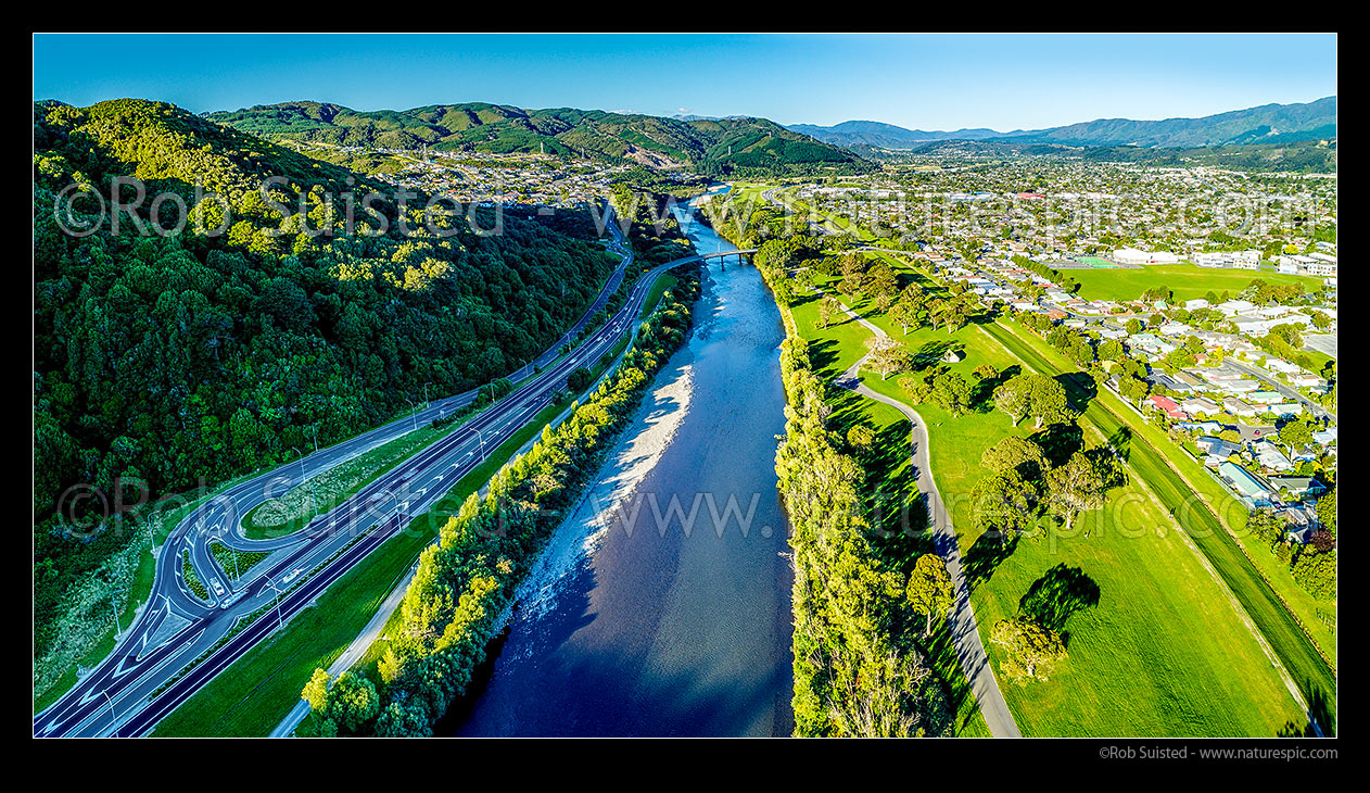 Image of Hutt River in the Upper Hutt valley near Trentham. River Road (SH2) crossed the Hutt River with Riverstone Terraces far left, Moonshine Park and Upper Hutt City right. Tararua Ranges beyond. Aerial panorama, Upper Hutt, Wellington Region, New Zealand (NZ) stock photo image