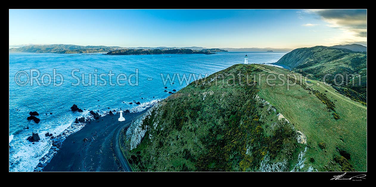 Image of Pencarrow Head lighthouses at Wellington Harbour entrance. Wellington and Miramar Peninsula beyond. Aerial panorama. Barrett Reef centre, Pencarrow Head, Hutt City District, Wellington Region, New Zealand (NZ) stock photo image