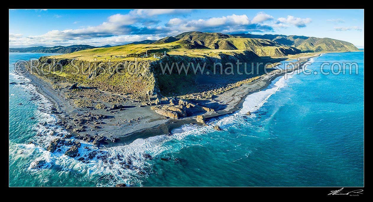 Image of Baring Head at Wellington Harbour entrance. Fitzroy Bay and Wellington far left, Baring Head lighthouse centre, Turakirae Head far right. East Harbour Regional Park. Aerial panorama, Baring Head, Hutt City District, Wellington Region, New Zealand (NZ) stock photo image