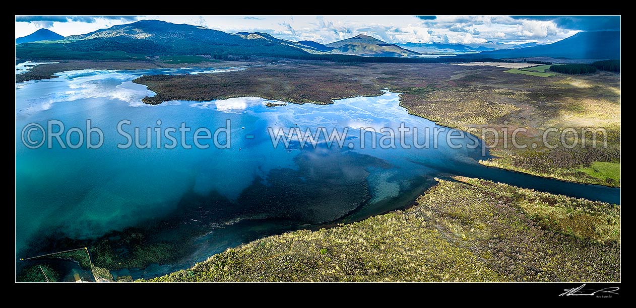 Image of Lake Otamangakau. Mt Kakaramea (1300m) at left, Lake Rotoaira far right, Otamangakau canal at right. Aerial panorama, Tongariro, Ruapehu District, Manawatu-Wanganui Region, New Zealand (NZ) stock photo image