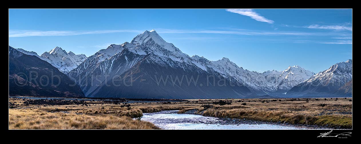 Image of Aoraki / Mount Cook (3754m) standing above the Tasman Valley. Hooker Valley and Southern Alps at left, Mt Cook Range centre, Tasman Glacier at right. Panorama, Aoraki / Mount Cook National Park, MacKenzie District, Canterbury Region, New Zealand (NZ) stock photo image