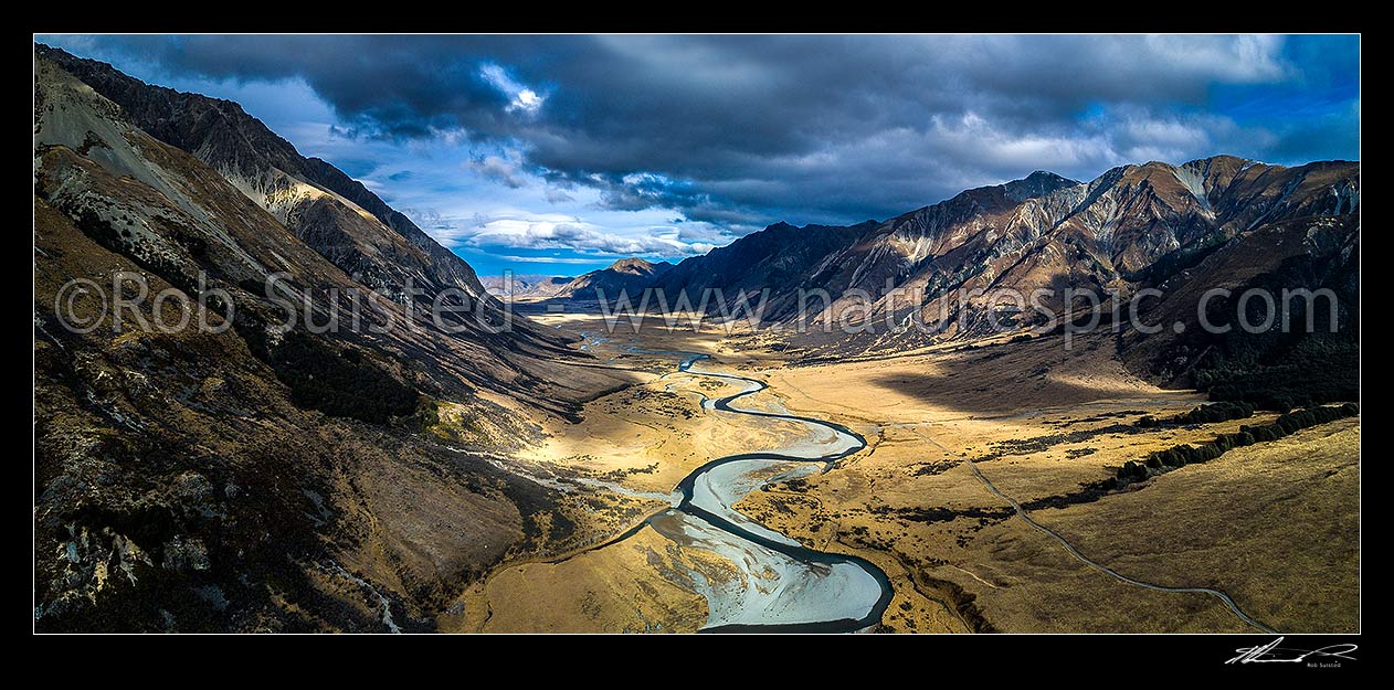 Image of Ahuriri River Valley headwaters and river flats. Broad braided river valley, now in Ahuriri Conservation Park. Aerial panorama downtream from Birchwood Station toward Ben Avon, Ahuriri River, Waitaki District, Canterbury Region, New Zealand (NZ) stock photo image