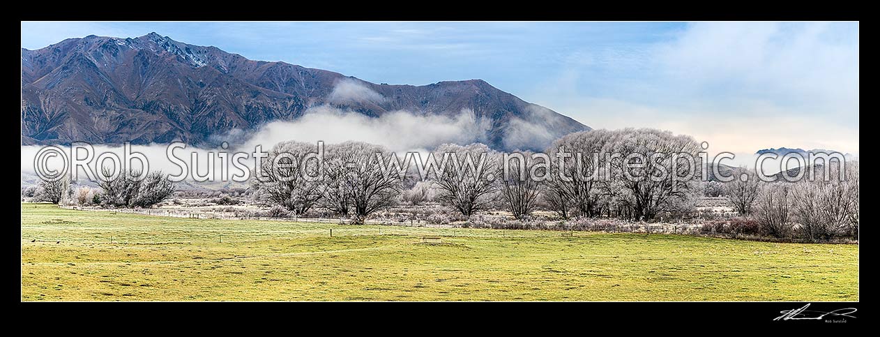 Image of Heavy frost, or hoar frost, amongst Ahuriri riverflats and farmland near Omarama. Benmore Range beyond. Panorama, Omarama, Waitaki District, Canterbury Region, New Zealand (NZ) stock photo image