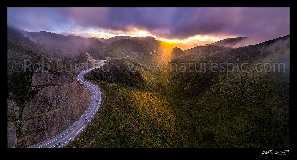 Image of Remutaka (Rimutaka) Hill Road (State Highway 2, SH2) climbing over the Remutaka (Rimutaka) Ranges (to 555m) from Upper Hutt to the Wairarapa. Aerial panorama on a moody evening, Remutaka, Upper Hutt City District, Wellington Region, New Zealand (NZ) stock photo image