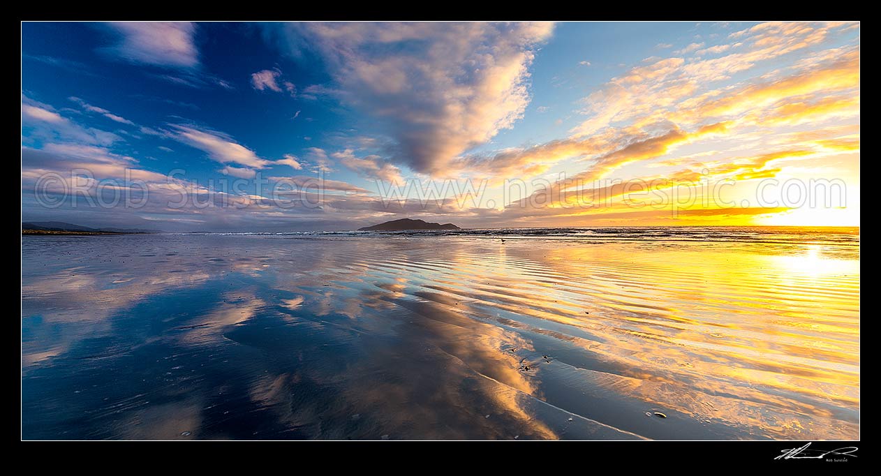 Image of Kapiti Island seen from Te Horo Beach on a moody sunset evening. Panorama, Te Horo Beach, Kapiti Coast District, Wellington Region, New Zealand (NZ) stock photo image