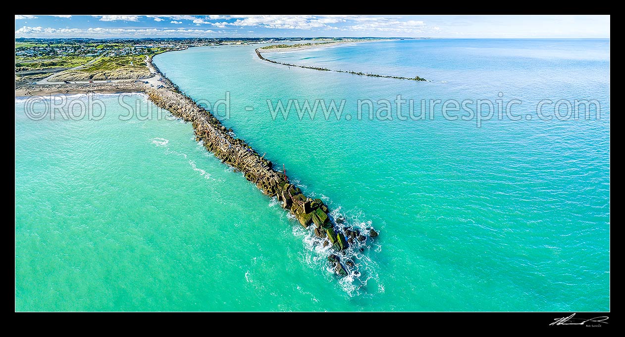 Image of Whanganui River mouth with north mole and mole jutting into the South Taranaki Bight. Whanganui city behind. Castlecliff beach left. Aerial panorama, Whanganui, Wanganui District, Manawatu-Wanganui Region, New Zealand (NZ) stock photo image