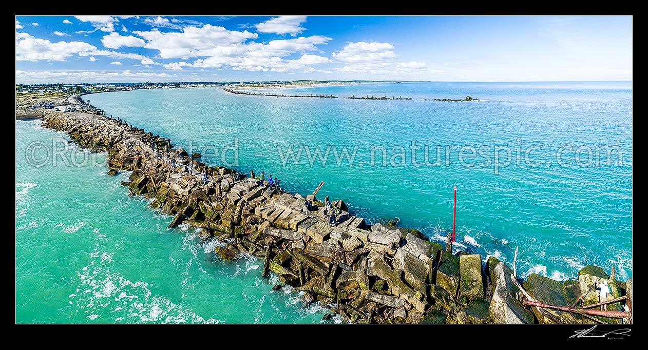 Image of Whanganui River mouth, looking over the North Mole, with fishermen seeking Kahawai fish. Aerial panorama, Whanganui, Wanganui District, Manawatu-Wanganui Region, New Zealand (NZ) stock photo image