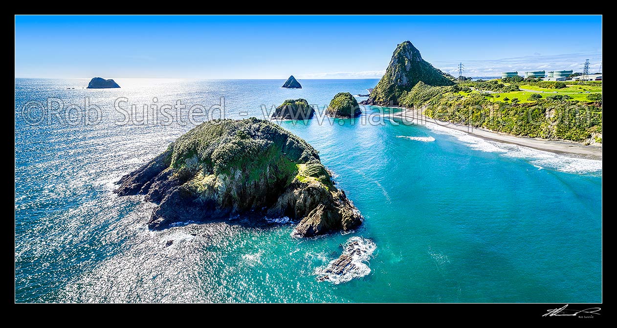 Image of Sugarloaf Islands and Paritutu Rock (154m). Motuotamatea Is. (Snapper Rock) front, Motumahanga (Saddleback Rock) left, Whareumu (Lion Rock), Pararaki (Seagull Rock) and Mataora (Round Rock) centre. Aerial panorama, New Plymouth, New Plymouth District, Taranaki Region, New Zealand (NZ) stock photo image