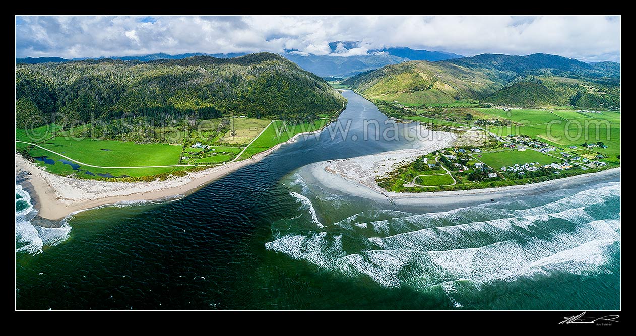 Image of Mokihinui River mouth, with Mokihinui township and Summerlea at right. Seddonville and Glasgow Range behind. Aerial panorama, Mokihinui, Buller District, West Coast Region, New Zealand (NZ) stock photo image