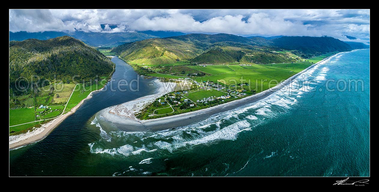 Image of Mokihinui River mouth, with Mokihinui township and Summerlea centre. Seddonville and Glasgow Range behind. Aerial panorama looking down coast towards Hector, Mokihinui, Buller District, West Coast Region, New Zealand (NZ) stock photo image