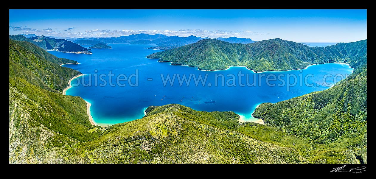 Image of Arapaoa (Arapawa) Island. Onauku Bay (right) in East Bay, seen from above Bald Hill and Otonga Point. Mokopeke Bay bottom right. Parea Point and Pickersgill Island far left. Aerial panorama, Arapawa Island, Marlborough Sounds, Marlborough District, Marlborough Region, New Zealand (NZ) stock photo image