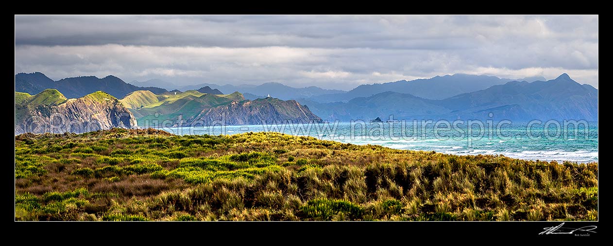 Image of Taharoa coastline looking south past Motunau Rocks to Mt Pehimatea (468M) at far right. Taharoa coastal navigation markers visible. Panorama, Taharoa, Waitomo District, Waikato Region, New Zealand (NZ) stock photo image