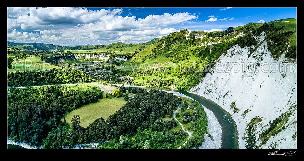 Image of Rangitikei River and white siltstone / paapa / papa cliffs distinctive of the district. Aerial panorama over river valley and farmland, Mangaweka, Rangitikei District, Manawatu-Wanganui Region, New Zealand (NZ) stock photo image