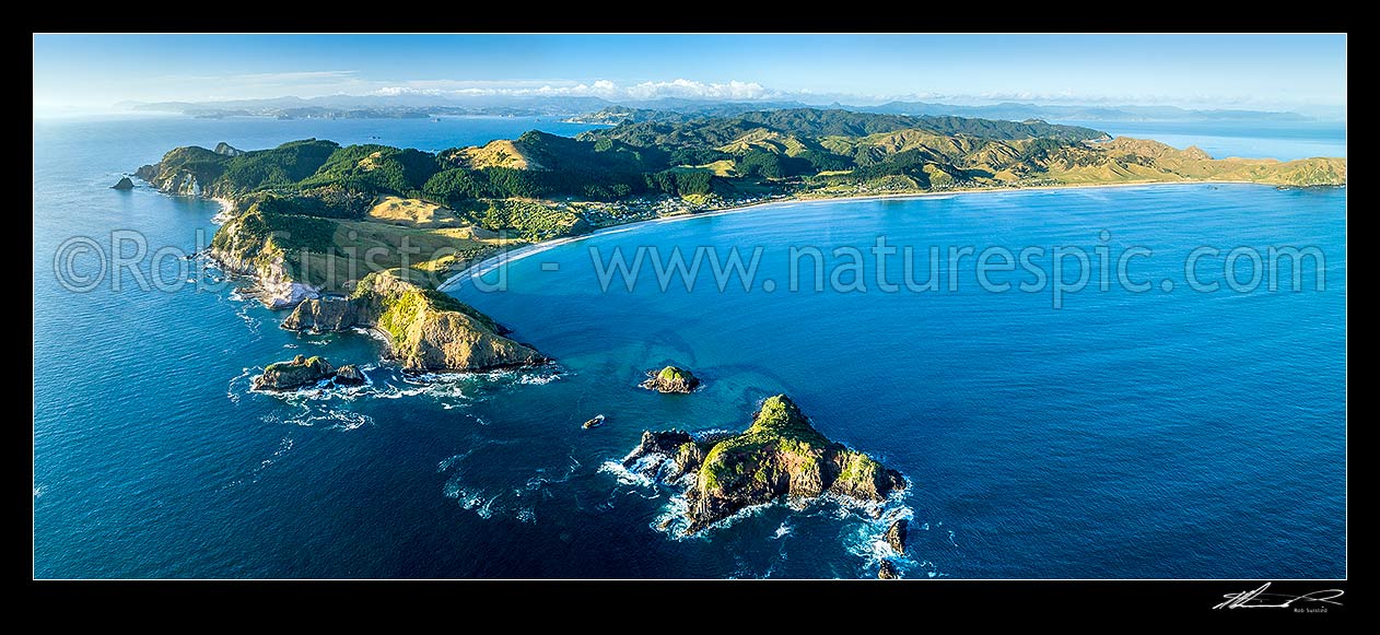 Image of Opito Bay and Opito Beach aerial panorama. Opito Point and Rabbit Island bottom left. Mercury Bay distant left, Opito Bay, Coromandel Peninsula, Thames-Coromandel District, Waikato Region, New Zealand (NZ) stock photo image