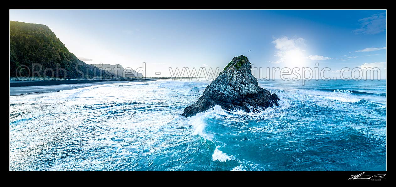 Image of Panatahi Island offshore of Karekare Beach and Karekare Point. Aerial view looking towards Whatipu. Dawn aerial panorama, Karekare Beach, Waitakere City District, Auckland Region, New Zealand (NZ) stock photo image