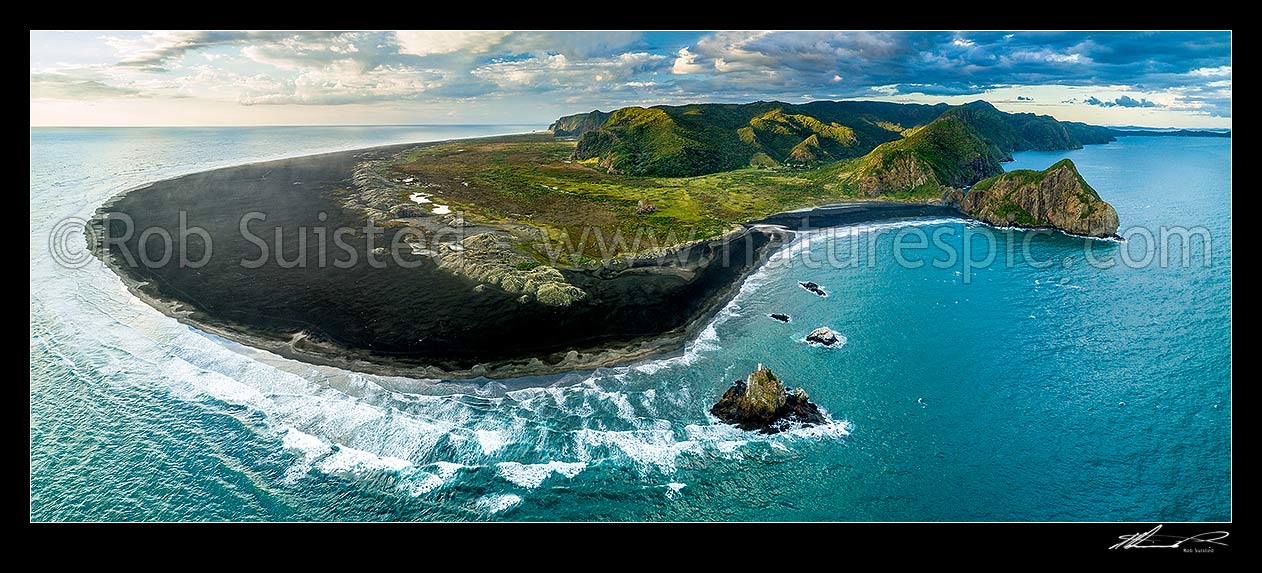 Image of Whatipu Beach and Manukau Harbour entrance (right), looking north past Ninepin Rock lighthouse and black ironsand. Paratutae Island and Waitakere Ranges right. Aerial panorama, Whatipu Beach, Waitakere City District, Auckland Region, New Zealand (NZ) stock photo image