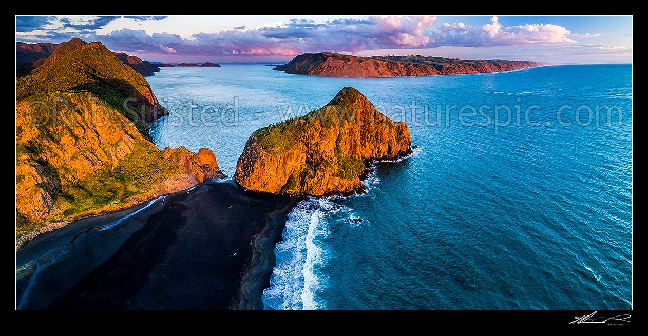 Image of Paratutae Island guarding entrance to Manukau Harbour at Whatipu Beach, with Burnett Head and Wonga Wonga Bay centre left. South Head and Awhitu Peninsula beyond right. Aerial panorama at dusk, Whatipu Beach, Waitakere City District, Auckland Region, New Zealand (NZ) stock photo image