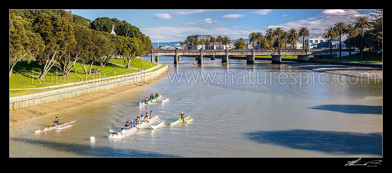 Image of Gisborne City and Turanganui River, with young people practicing Waka Ama outrigger canoe racing. Panorama, Gisborne City, Gisborne District, Gisborne Region, New Zealand (NZ) stock photo image