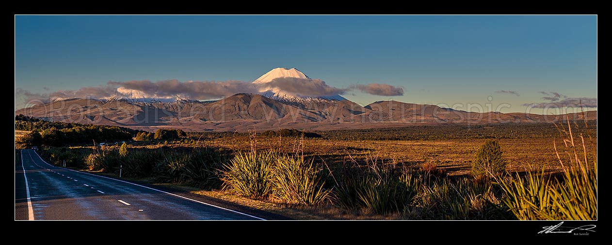 Image of Mt Ngauruhoe (2287m), a volcano in Tongariro National Park. Mount Tongariro obscured by cloud to left. Panorama from State Highway 47, Tongariro National Park, Ruapehu District, Manawatu-Wanganui Region, New Zealand (NZ) stock photo image