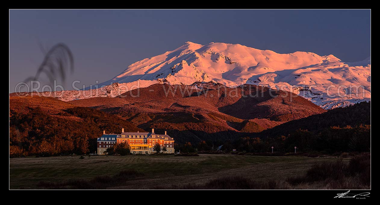 Image of Mt Ruapehu (2797m) above the Grand Chateau at Whakapapa Village. Panorama at dusk, Tongariro National Park, Ruapehu District, Manawatu-Wanganui Region, New Zealand (NZ) stock photo image