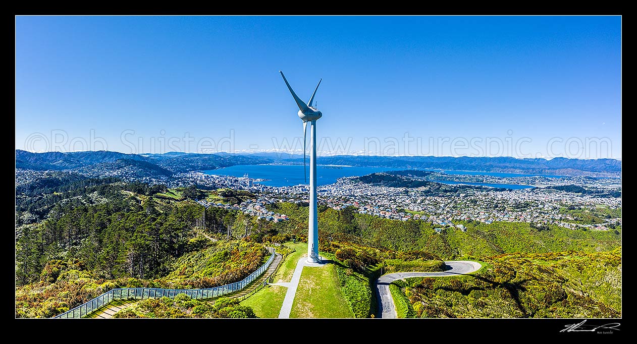 Image of Wellington's Brooklyn wind turbine above Wellington Wellington City and Harbour. Aerial panorama, Wellington, Wellington City District, Wellington Region, New Zealand (NZ) stock photo image