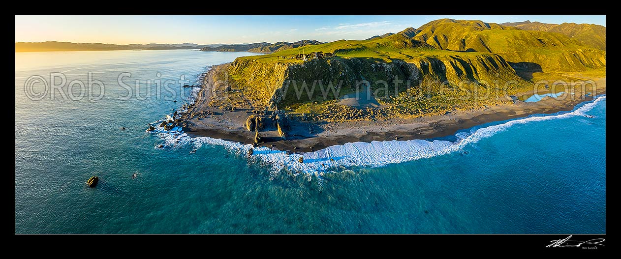 Image of Baring Head lighthouse and East Harbour Regional Park. Aerial panorama, with Wellington Harbour entrance at left. Wainuiomata River at right, Baring Head, Hutt City District, Wellington Region, New Zealand (NZ) stock photo image