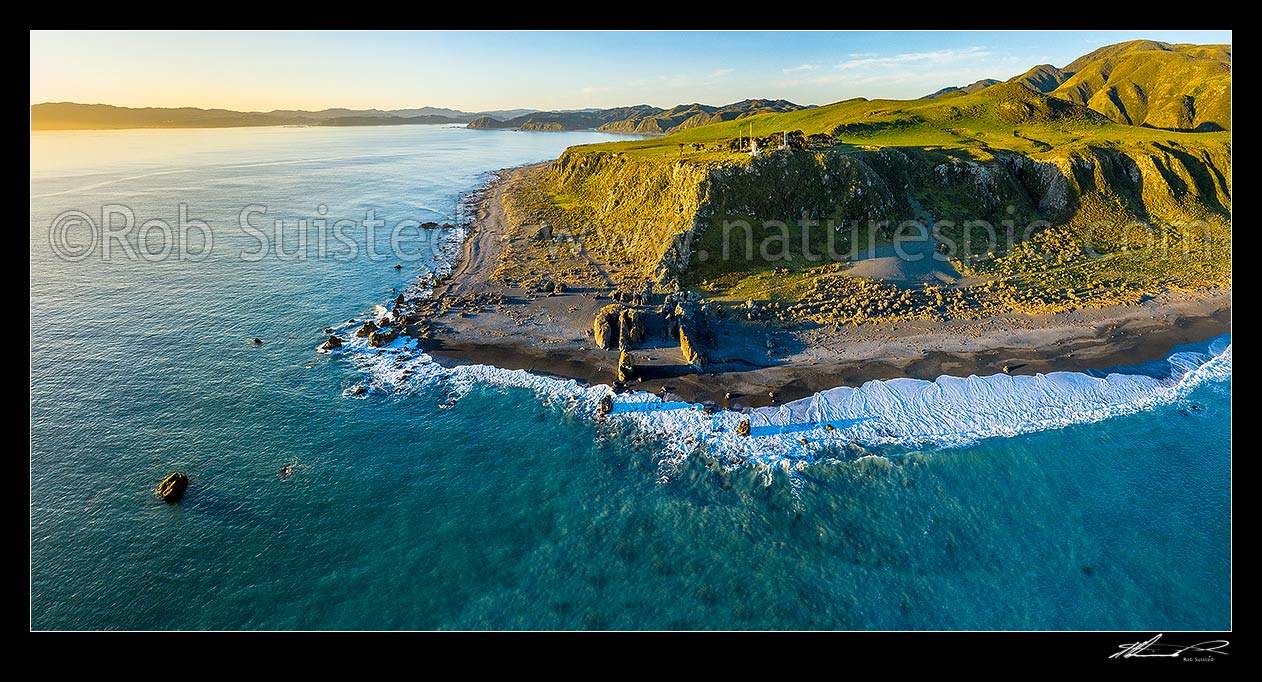 Image of Baring Head lighthouse and East Harbour Regional Park. Aerial panorama, with Wellington Harbour entrance at left. Fitzroy Bay centre, Baring Head, Hutt City District, Wellington Region, New Zealand (NZ) stock photo image