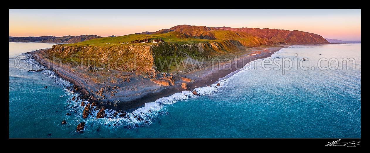 Image of Baring Head lighthouse aerial panorama with Fitzroy Bay at left, Turakirae Head at right. East Harbour Regional Park at dusk, Baring Head, Hutt City District, Wellington Region, New Zealand (NZ) stock photo image