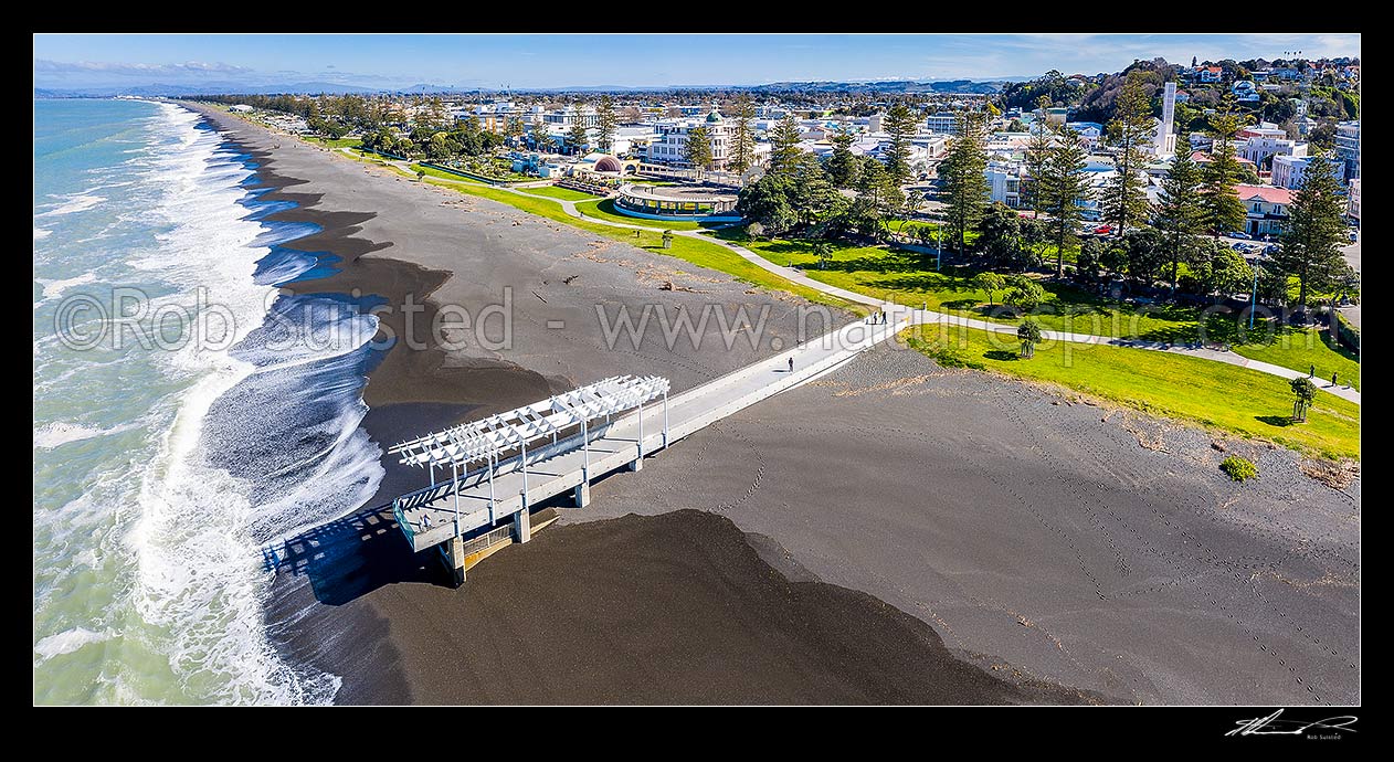 Image of Napier foreshore and Marine Parade Marine Outfall and Viewing Platform, with landmarks inlcuding the Soundshell and T&G Building behind. Aerial view, Napier, Napier City District, Hawke's Bay Region, New Zealand (NZ) stock photo image