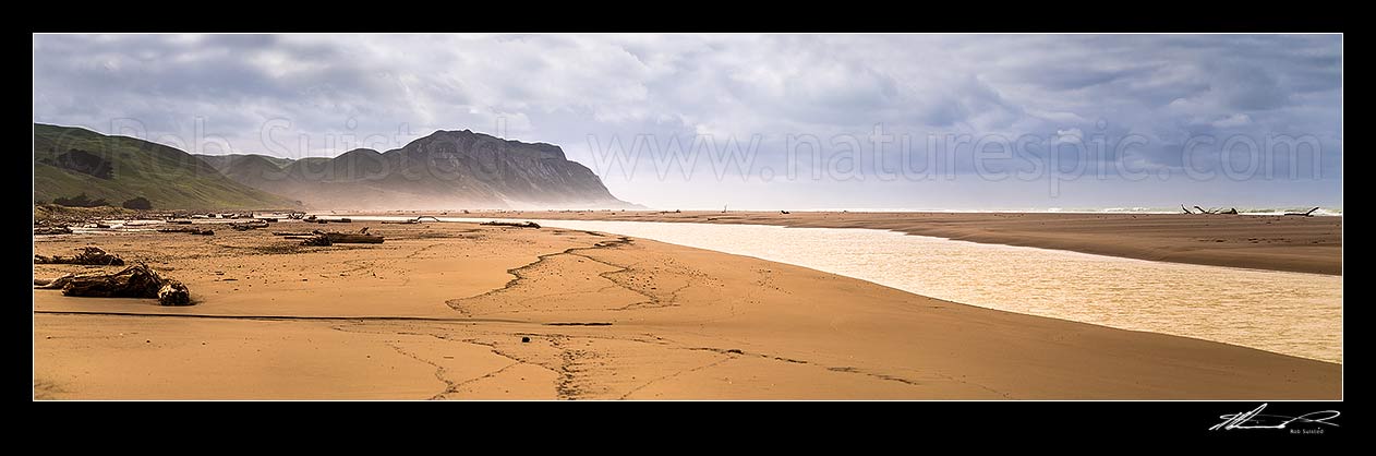 Image of Cape Turnagain, prominent headland off central Hawke's Bay, seen from Herbertville coast. Named by Captain James Cook in 1769 as the point he turned to head north. Panorama, Herbertville, Tararua District, Manawatu-Wanganui Region, New Zealand (NZ) stock photo image