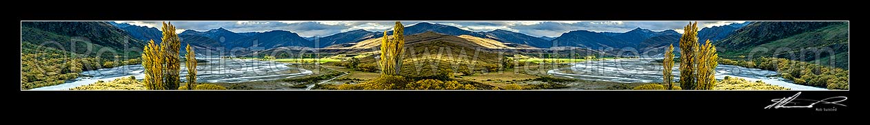 Image of Shotover River and The Branches Station flats lit by sunlight with autumn coloured trees. Mt Greenland (1906m) at left. Artifical anorama created for massive mural, Branches Station, Shotover Valley, Queenstown Lakes District, Otago Region, New Zealand (NZ) stock photo image