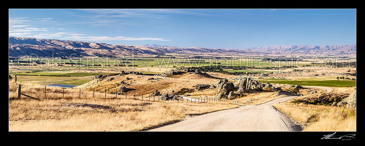 Image of Upper Taieri Plain seen from near Paerau. Panorama over irrigated plains of the Upper Taieri towards the Hawkdun and Ida Ranges. Maniototo, Patearoa, Central Otago District, Otago Region, New Zealand (NZ) stock photo image