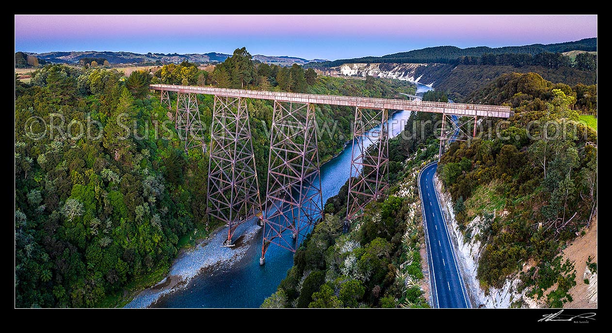 Image of Mohaka Viaduct, railway viaduct spanning the Mohaka River in northern Hawkes Bay, 277 metres long, and at 95m, the tallest viaduct in Australasia. Aerial panorama, Raupunga, Wairoa District, Hawke's Bay Region, New Zealand (NZ) stock photo image