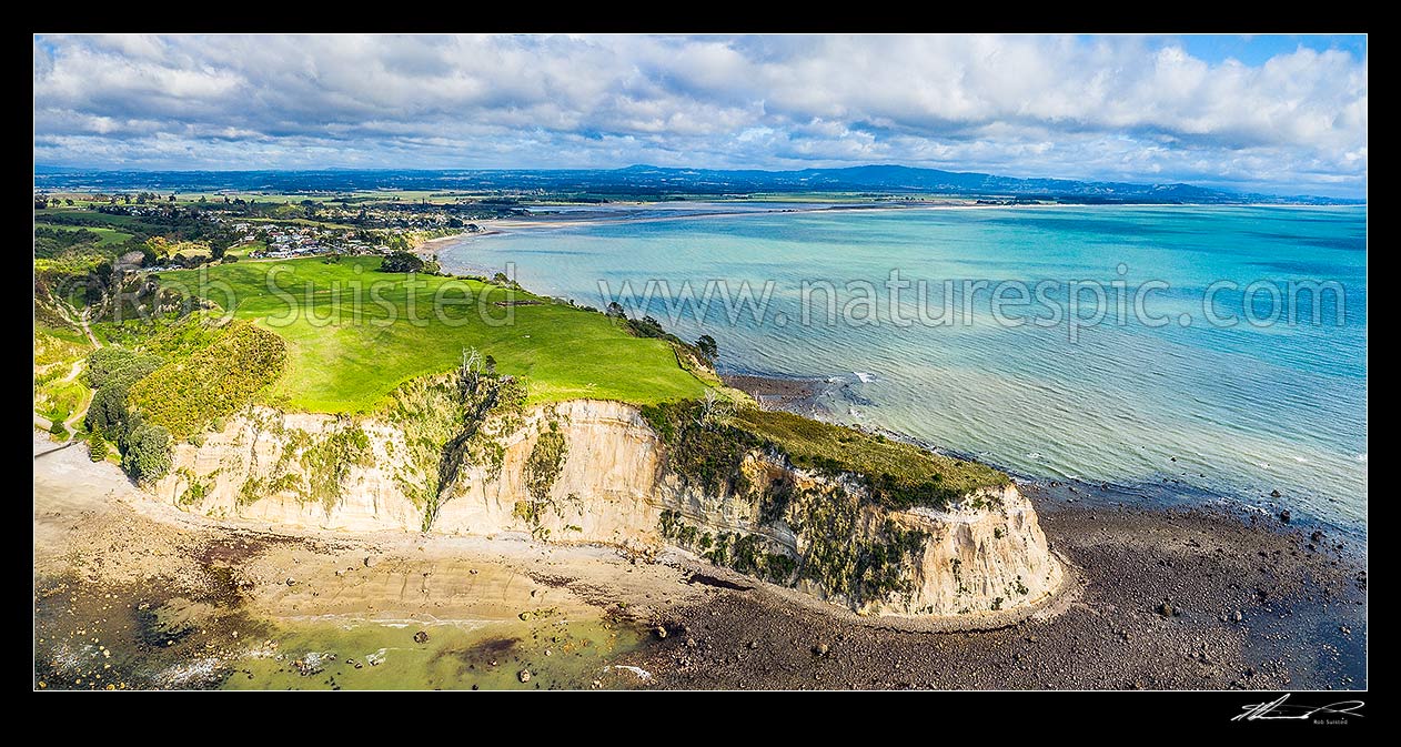 Image of Okurei Point, with Maketu township and Maketu Estuary behind. Aerial panorama, Maketu, Western Bay of Plenty District, Bay of Plenty Region, New Zealand (NZ) stock photo image