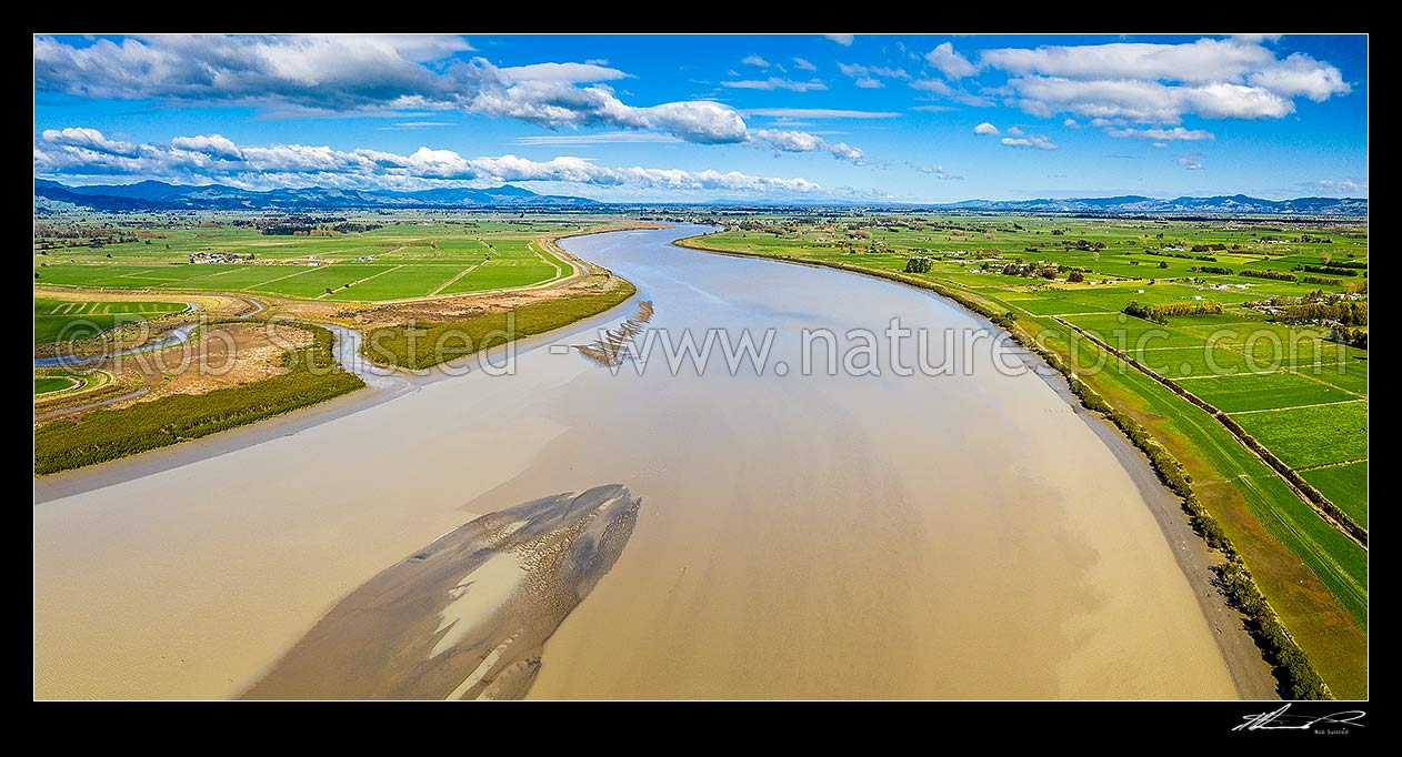 Image of Waihou River, draining eastern Waikato plains into the Hauraki Gulf in the Firth of Thames. Aerial panorama looking upstream from near Kopu, Thames, Hauraki District, Waikato Region, New Zealand (NZ) stock photo image