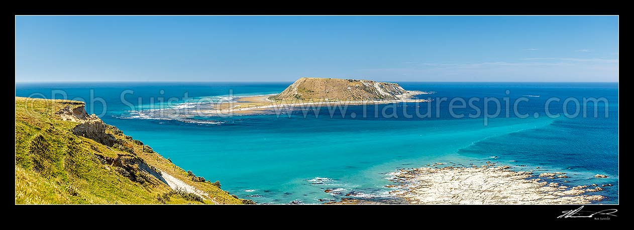 Image of Portland Island, also called Waikawa Island, a small island off the southern tip of the Mahia Peninsula at Ahuriri Point (foreground). Panorama, Mahia, Wairoa District, Hawke's Bay Region, New Zealand (NZ) stock photo image