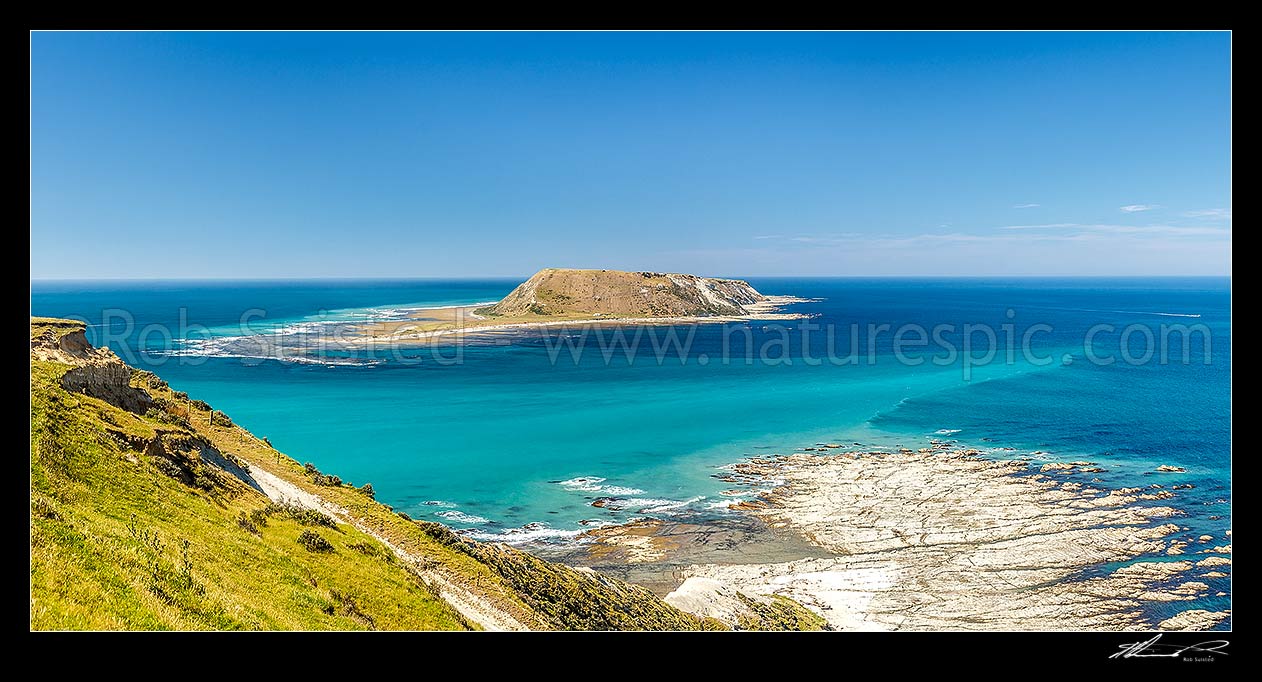 Image of Portland Island, also called Waikawa Island, a small island off the southern tip of the Mahia Peninsula at Ahuriri Point (foreground). Panorama, Mahia, Wairoa District, Hawke's Bay Region, New Zealand (NZ) stock photo image