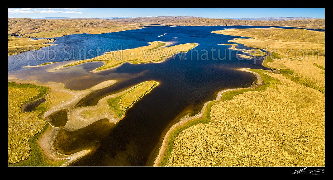 Image of Lake Onslow high in the Lammermoor Ranges. Formed in 1890 by damming of Teviot River and Dismal Swamp. Aerial panorama looking north, Roxburgh, Central Otago District, Otago Region, New Zealand (NZ) stock photo image